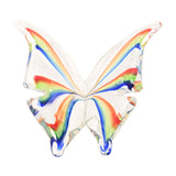 Clear glass butterfly figurine with open V-shaped wings featuring rainbow stripes of red, orange, green and blue, shown on a plain white background.