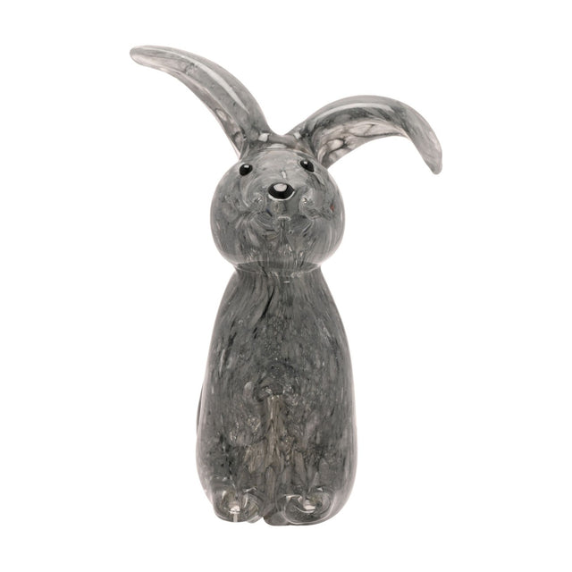 Floppy Eared Sitting Rabbit glass figurine in flecked grey, one ear upright and one curled, black eyes and nose, on a plain white background.