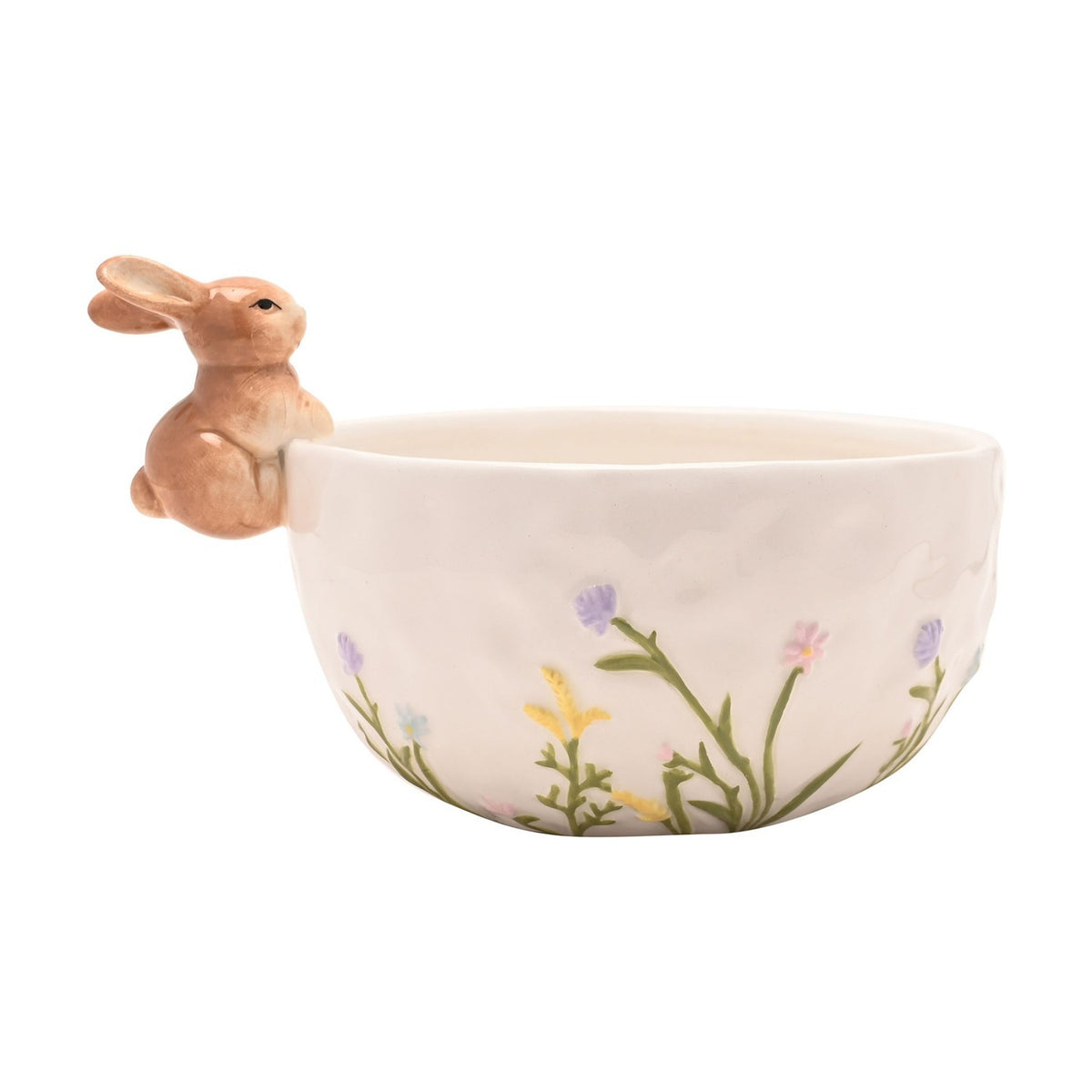 White round ceramic bowl with a 3D sandy brown bunny perched on the rim and pastel wild flowers in lilac, pink, yellow and blue across the front, on a plain background.