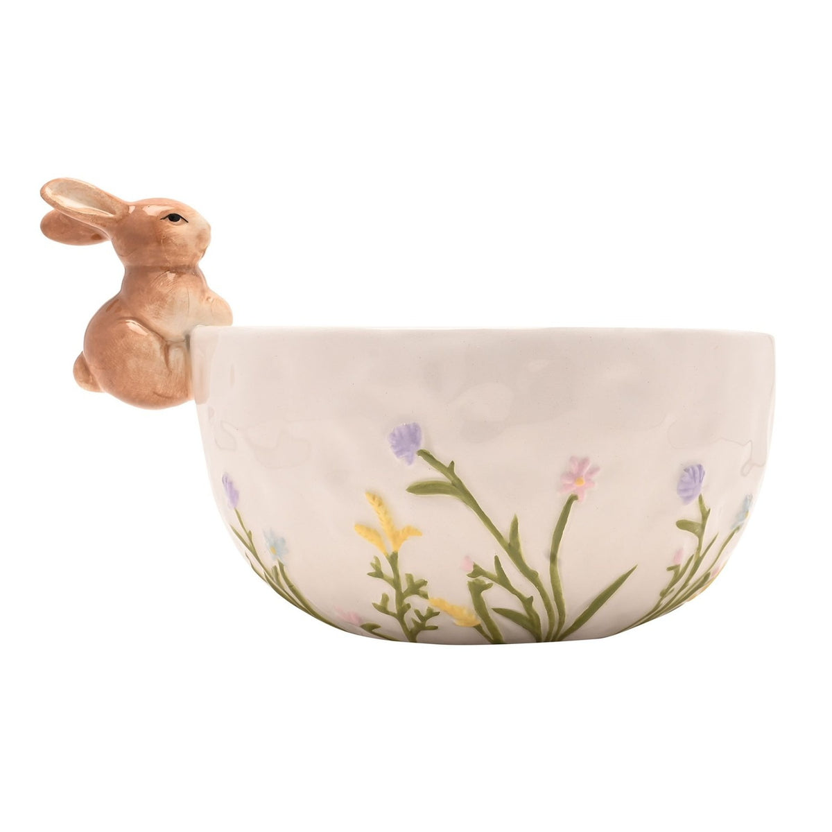 White ceramic round bowl with a 3D sandy brown bunny perched on the rim, pastel wild flowers in lilac, pink, yellow and blue on the front, plain white background.