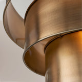 Close-up of Endon Carlwick Tiered Pendant showing two stacked cylindrical shades in aged brass with a brushed finish and warm inner glow.