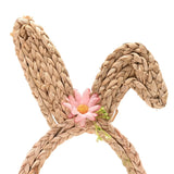Faux Flower Bunny Ears decoration in natural woven braid, one ear upright and one folded, accented with a pink faux daisy, shown on a plain white background.