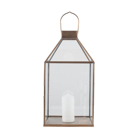 Shiny Brass & Glass Lantern, 49cm, with peaked roof, top handle and clear glass panels, shown with a white pillar candle inside on a plain white background.