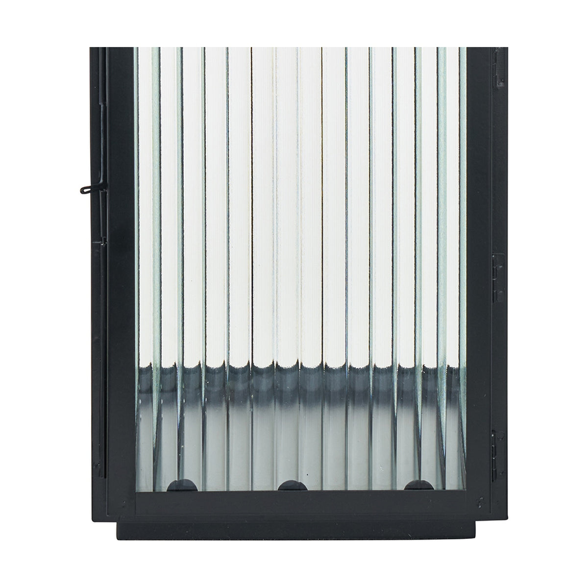 Close-up of a black iron candle lantern with vertical ribbed glass panels and a hinged door, shown against a plain white background.