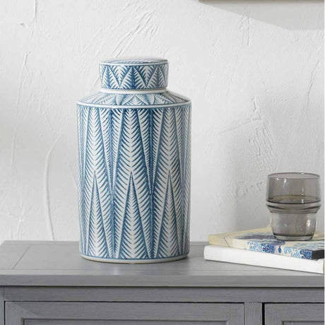 Samara Blue & White Ceramic Aztec Design Lidded Ginger Jar, 28cm, with chevron patterning, shown on a grey sideboard beside books and a glass tumbler.