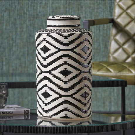 Chirala Black & White Ceramic Aztec Design Lidded Ginger Jar, 35cm, with geometric diamond pattern, shown on a glass table in a living room setting.