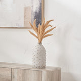 Kali Textured Dot Light Grey Stoneware Vase, 31cm, with a bobble-textured tapered body holding dried pampas grass stems, styled on a wooden sideboard against a white wall.