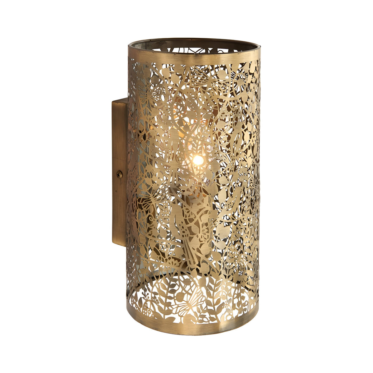 Endon Cliffmere cylindrical wall light in antique brass steel with cut-out secret-garden design of leaves, dragonflies and birds, single E14 bulb lit inside.