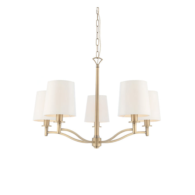 Endon Castwell 5 light pendant in antique brass with vintage white fabric shades on curved arms, suspended from a chain, on a white background.