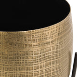 Close-up of Libra Interiors Etched Brass Standing Planter showing the cross-hatched brass finish and black metal leg.
