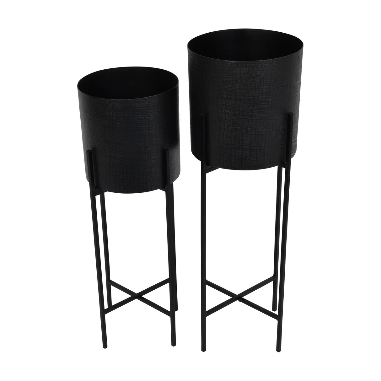Libra Interiors Etched Iron set of two floor standing planters in matt black, cylindrical pots with cross hatch texture on slim four leg stands.