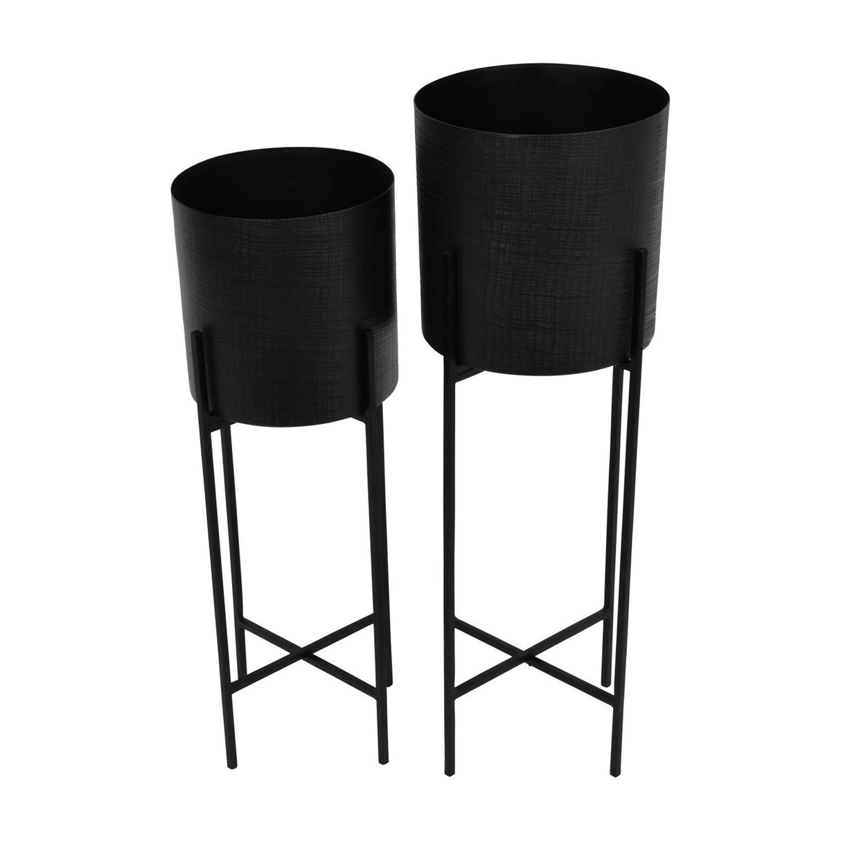 Libra Interiors Etched Iron Set of 2 Floor Standing Planters in matt black, cylindrical pots with cross hatch texture on slim four leg stands.