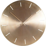 Libra Interiors Brushed Gold Iron Round Wall Clock with raised hour markers and slim matching hands on a warm antique brass metal face.