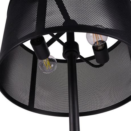 Close-up of Libra Interiors Mesh Shade Iron Floor Lamp in black, showing two exposed filament bulbs inside the perforated drum shade and central stem.
