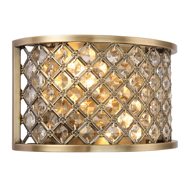 Endon Prescott 2-light wall fitting in antique brass with a curved steel frame dressed in clear crystal beads in a diamond lattice pattern.