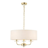 Endon Castdon 3 light pendant in brass with a wide vintage white faux silk drum shade, K9 crystal detail on three arms, and chain suspension.