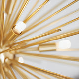 Close-up of the Merrick 9 Light Sputnik Pendant in satin brass, showing star-burst metal rods radiating from the centre with small G9 bulb tips against a plain light background.