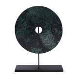 Libra Interiors Green Marble Disc Sculpture with a small central opening, mounted upright on a slim black iron stem and flat base.