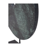 Close-up of Libra Interiors Green Marble Disc Sculpture showing textured deep green and black marble on a slim matt black iron stem and base.