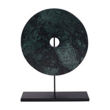 Libra Interiors Green Marble Disc Sculpture with deep green and black veined stone, small central opening, on a slim black iron stem and flat base.