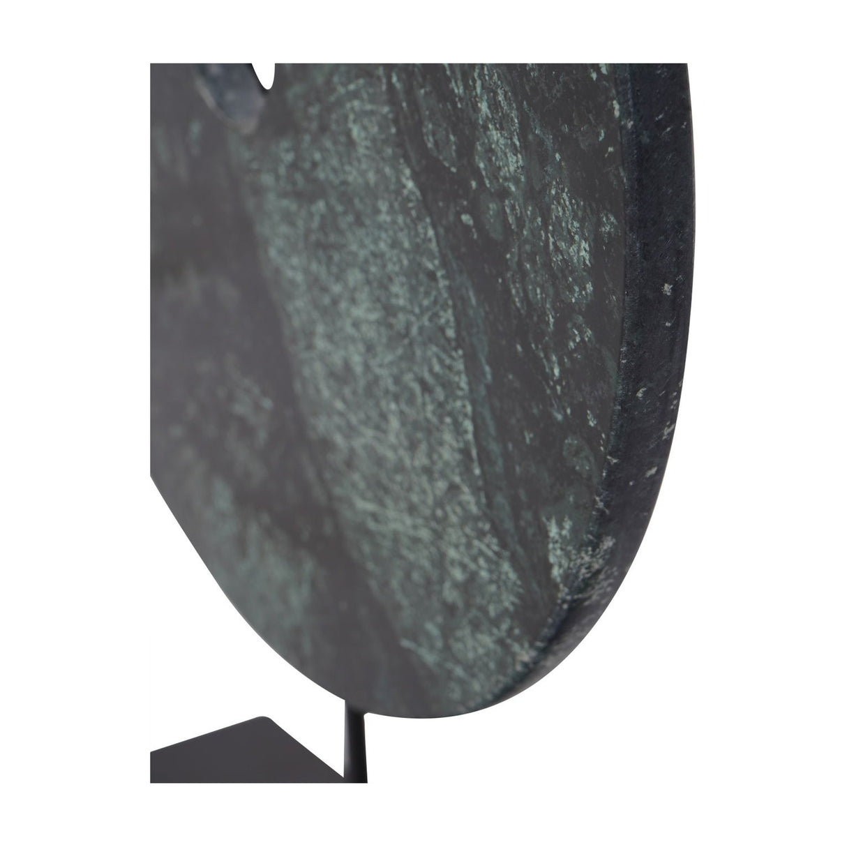 Close-up of the Libra Interiors Green Marble Disc Sculpture showing textured deep green and black veining on the round marble face above its matt black base.