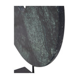 Close-up of the Libra Interiors Green Marble Disc Sculpture showing textured deep green and black veining on the round marble face above its matt black base.