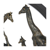 Close-up of Libra Interiors LED Giraffe Family light, showing antique bronze resin giraffes with textured patterning against a matt black ring.