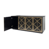 Libra Interiors Fretwork sideboard in black-washed mango wood with three visible geometric iron fretwork doors in gilded dark bronze, one door open.