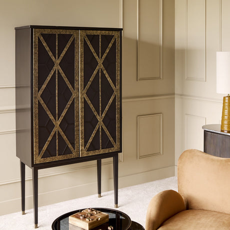 Libra Interiors Fretwork Two-Door Black and Gold Drinks Cabinet with geometric iron fretwork on mango wood, tapered legs, styled in a panelled lounge.