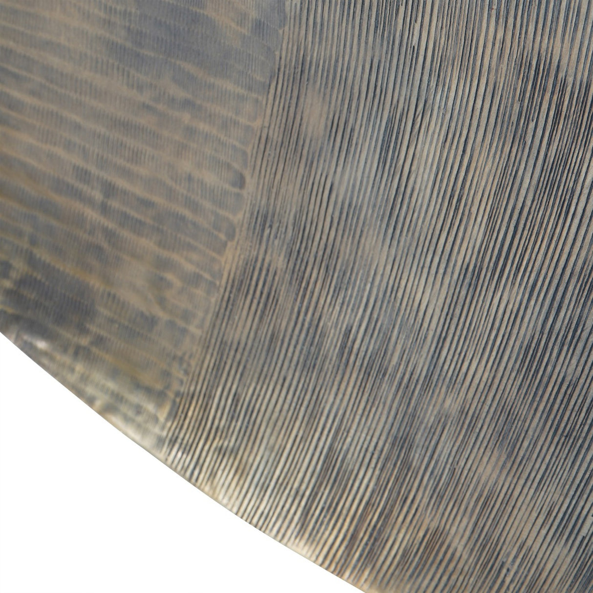Close-up of Libra Interiors Round Textured Aluminium Wall Art in antique brass, showing hand-applied concentric line detailing and rippled edge texture.