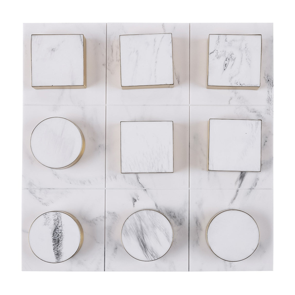 Libra Interiors Marble Effect noughts and crosses game shown top-down with square blocks and circular counters, white marble resin finish and brass-tone edging.