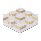 Libra Interiors Marble Effect White and Brass Noughts and Crosses Game with square marble-look board, circular counters and square blocks edged in brass tone.