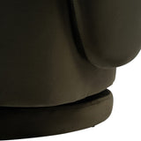 Close-up of the Libra Interiors Velvet Swivel Accent Armchair in green, showing the padded arm, curved back and low swivel plinth base.