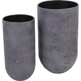 Libra Interiors Textured Iron Cylinder Planters in mottled blue-grey with gold flecks, shown as a tall and shorter pair with matt black interiors.