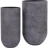 Libra Interiors Textured Iron Cylinder Planters, a pair of tall rounded-base cylinders in mottled blue-grey with rustic gold flecks and matt black interiors.