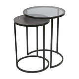 Libra Interiors Slate Effect Iron Nesting Side Tables in black, pairing a tinted glass round top with a smaller slate-effect top on slim iron frames.