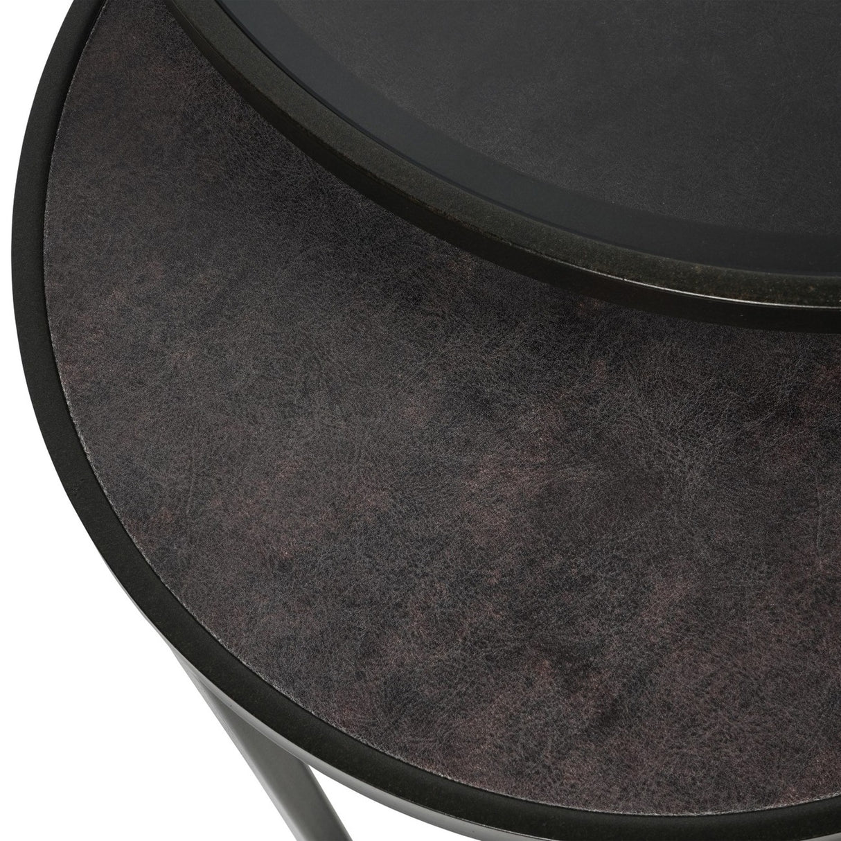 Close-up of Libra Interiors Slate Effect Iron Nesting Side Table in black, showing the tinted glass top overlapping the textured slate-effect lower surface.