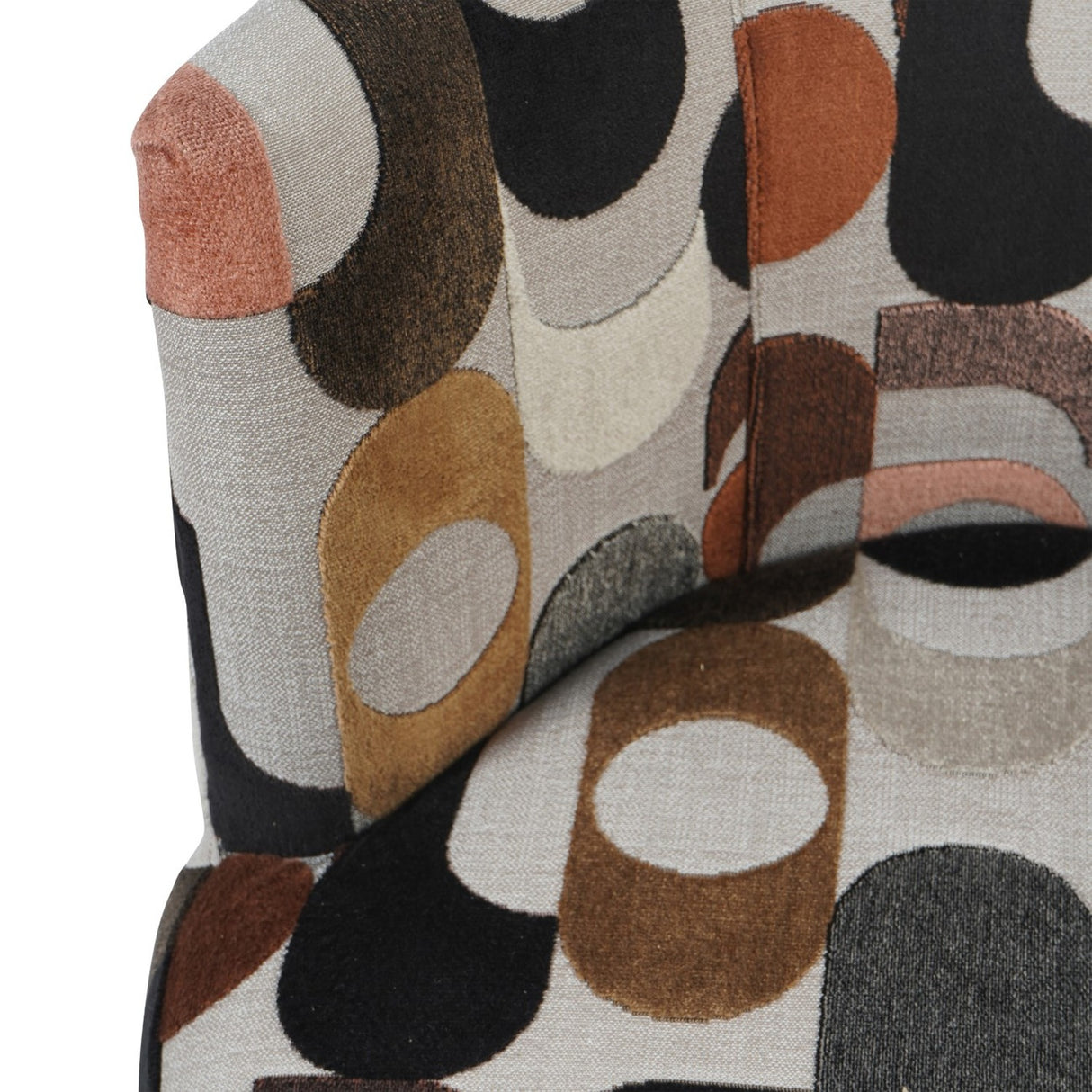 Close-up of Libra Interiors Patterned Velvet Swivel Armchair showing retro geometric circles in blush, ochre, espresso and black on neutral velvet.