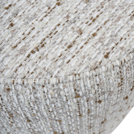 Close-up of Libra Interiors Textured Swivel Fabric Armchair in natural, showing the ivory, sand and almond flecked slub weave upholstery and seam detail.