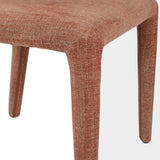 Close-up of the Libra Interiors Curved Back Fully Upholstered Dining Chair in warm brown woven fabric, showing the padded seat and tapered upholstered legs.