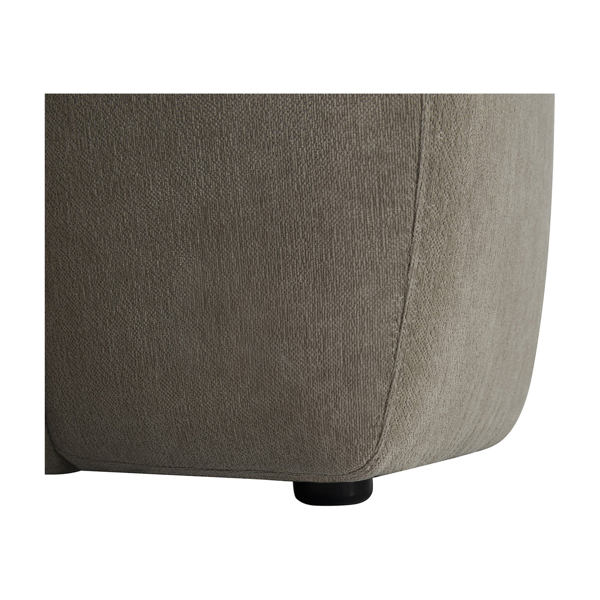 Close-up of the Libra Interiors Chenille 5-Piece Modular Sofa in natural beige, showing the soft low-pile fabric, side seam and small black foot.