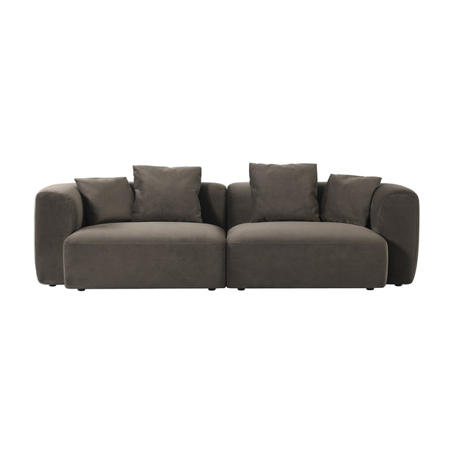 Libra Interiors Velvet Curved 2-Seater Modular Sofa in brown, shown as two rounded sections with deep seats and scatter cushions on a white background.