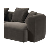 Libra Interiors Velvet Curved 2-Seater Modular Sofa in brown, showing the rounded arm section with plush scatter cushions and deep seat on a white background.