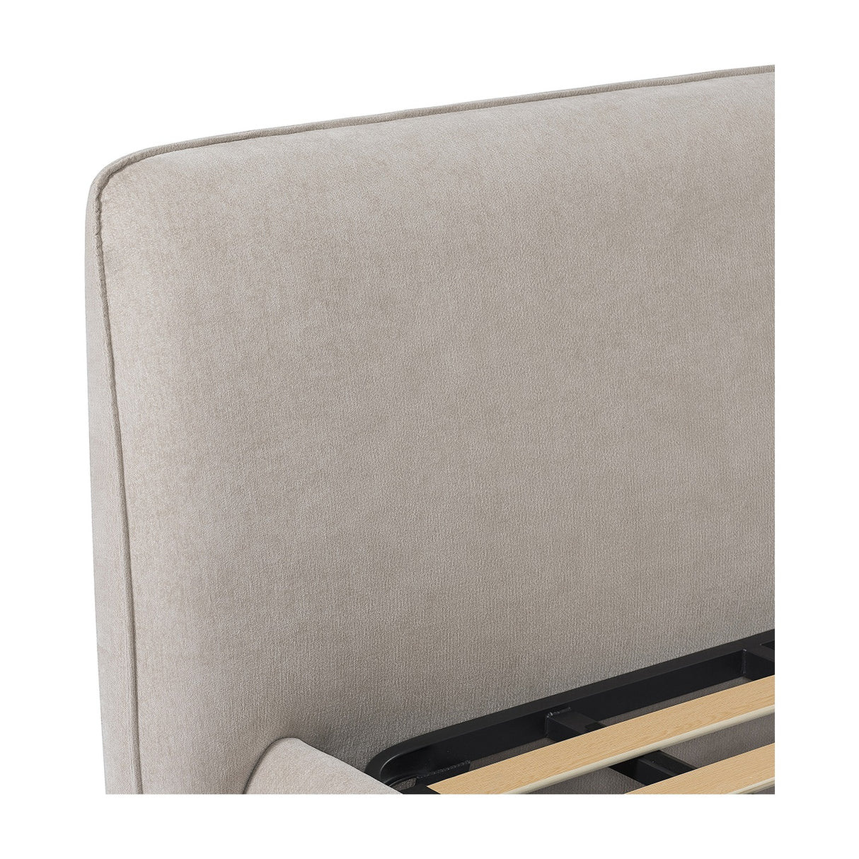 Close-up of the Libra Interiors Upholstered Chenille King Bed in beige, showing the padded headboard's curved edge and the slatted timber base inside.