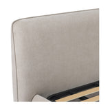 Close-up of the Libra Interiors Upholstered Chenille King Bed in beige, showing the padded headboard's curved edge and the slatted timber base inside.