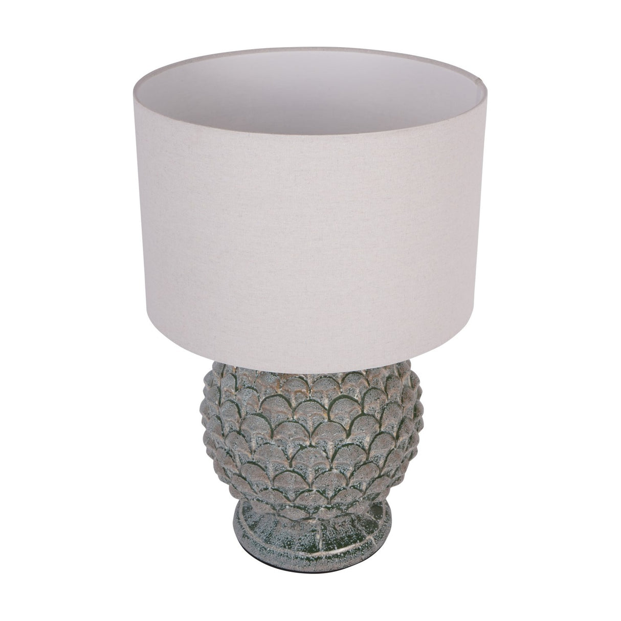 Libra Interiors Glazed Ceramic Artichoke table lamp with green mottled petal-textured base and neutral drum shade, shown on a plain white background.