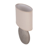 Libra Interiors Textured Ceramic Oval Table Lamp in grey with a rounded ring-patterned base and neutral linen-look oval shade, shown from above.