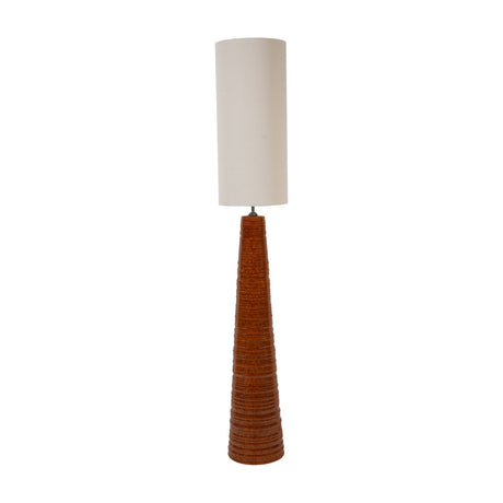 Libra Interiors Ribbed Ceramic Tapered Floor Lamp in terracotta with a ribbed cone base and tall cylindrical off-white linen shade on a plain background.