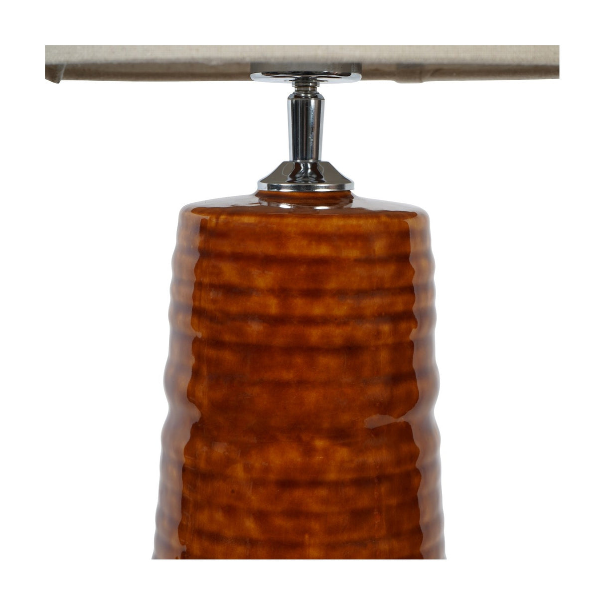 Close-up of the Libra Interiors Ribbed Ceramic Tapered Floor Lamp base in glazed terracotta, with chrome stem fitting and neutral linen shade above.