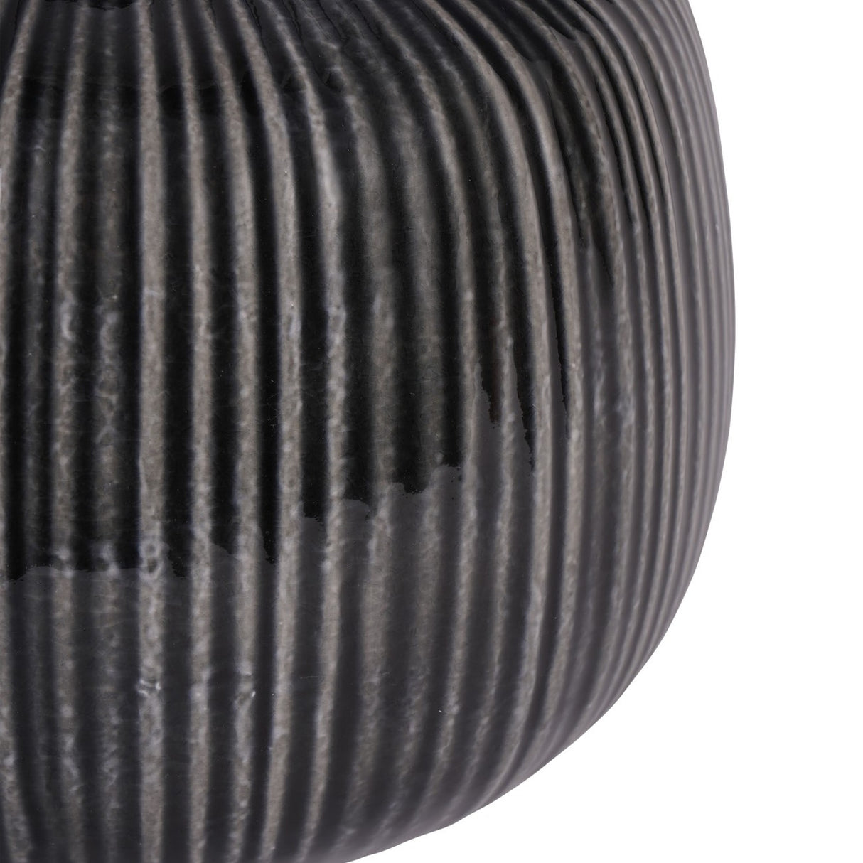 Close-up of the Libra Interiors Ribbed Ceramic Table Lamp in charcoal, showing the rounded base with fine vertical ribbing and glossy glazed finish.